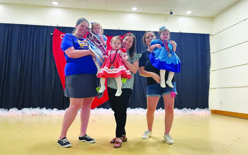 TODDLER MISS TOURNOI COURT - Shown, from left, are the members of the Toddler Miss Tournoi Court. They are Queen Logynn Woods; Alina Ortego, first runner-up; and Bryer Benoit, second runner-up.