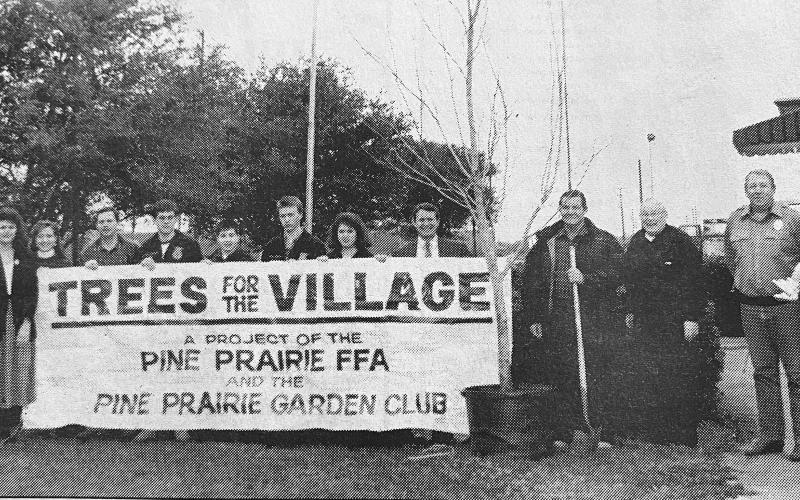 Shown, from left, are Village Clerk Danette Cloud, Erin Saunders, Pine Prairie Garden Club President Sheila Saunders, Pine Prairie Garden Club member Ruthie Evans, FFA advisor Kerry Saucier, FFA treasuer Billy James Johnson, FFA secretary Tav Leggett, FFA president Shane Barrett, FFA vice president Nikki Ardoin, state representative Dirk Deville, Pine Prairie Mayor Terrel McCauley, Father Leslie Prescott, Police Chief L.C. Deshotel and Weley and William Saunders.