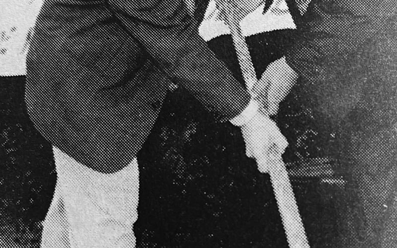 Deville (left) and McCauley worked together to plant a tree in front of the Pine Prairie Village Hall. (Gazette archive photos)