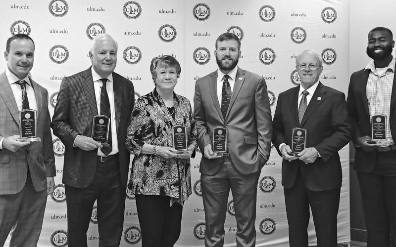 The University of Louisiana Monroe School of Construction Management (SOCM) held its spring awards luncheon with alumni awards given to deserving candidates, including, from left, Robert “Popie” Billeaud and Stuart Billeaud, Constructor of the Year award; Jane Shurley, Female Alumna of the Year; Andrew Barber, Under-40 Alumnus of the Year; Keith Roberts, Distinguished Alumnus of the Year and Donovan Stewart, Minority Alumnus of the Year.