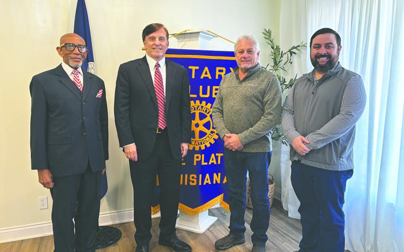 STATE TREASURER VISITS VILLE PLATTE - Louisiana State Treasurer Dr. John Fleming visited with the Ville Platte Rotary Club as the guest speaker on January 13. Shown, from left, are Elbert Guillory, Fleming, Rotarian Larry Lachney and Rotary President Beau Wilson. (Gazette photo by Heather Bogard)