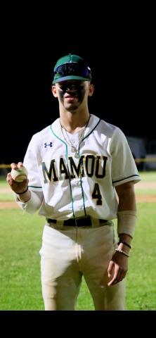 Devin Ardoin is pictured with his grand slam home run ball. (Photo courtesy of MHS Green Demon Baseball)