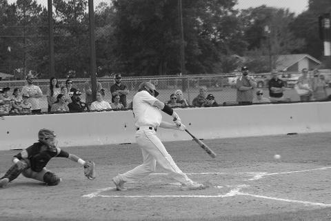 Caden Askey (7) connects with a pitch in a game against Church Point during a best-of-three playoff series held at Pine Prairie. The Panthers now play a best-of-three series at Red River in the second round. (Gazette photo by Rhett Manuel)