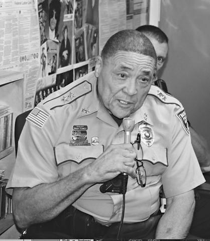 A. J. Frank, assistant police chief for the Town of Basile, speaks during a local law enforcement call-in show program on KVPI radio in Ville Platte. (KVPI Photo)