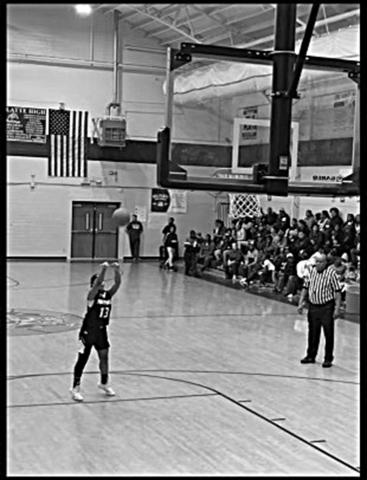 Kameron Allen shoots a basket from beyond the arc in a game played at Ville Platte High School. (Photo submitted)