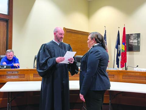 WILLIAMS IS APPOINTED JUROR - Angelica Williams (right) was sworn in by Ville Platte City Judge Greg Vidrine during the Evangeline Parish Police Jury meeting Monday evening, January 9, filling the District 8 seat left vacant by her husband, Ryan Leday Williams, the newly-sworn in Mayor of Ville Platte. (Gazette photo by Heather Bogard)