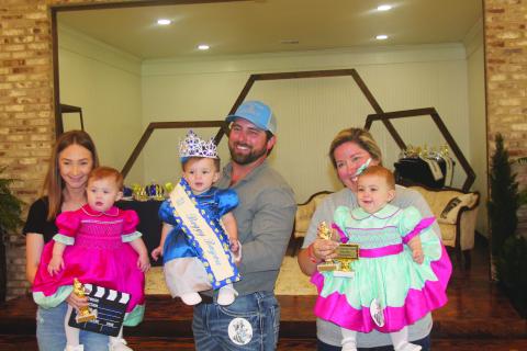 BABY MISS COURT - Shown, from left, are the members of the Baby Miss Boggy Bayou Court. They are Oaklee Beckham-Smith, first alternate, Queen Halle Chaddrick and Leacy Terro, second alternate.
