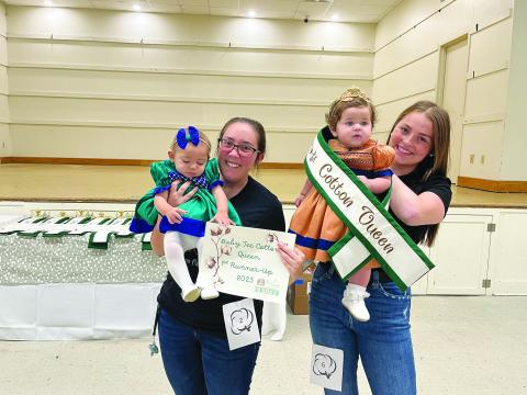 BABY TEE COTTON QUEEN - Shown, from left, are first runner-up Genesis Bothwell and Queen Olivia Sage Briscoe.
