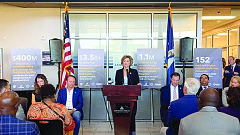 State Representative Rhonda Butler (center) is pictured as she speaks during a press conference announcing over $3.5 billion in rural broadband funding. (Photo courtesy of Representative Rhonda Butler)