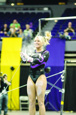 APRIL BURKHOLDER — Competed at LSU from 2003-06, graduating as the school’s most decorated gymnast and still ranking nearly two decades later among the elite in the program’s rich history. A 14-time All-American, she won 108 individual titles to set a school record, including the 2006 NCAA beam title with a score of 9.9125. (Photo courtesy of Louisiana Sports Hall of Fame)