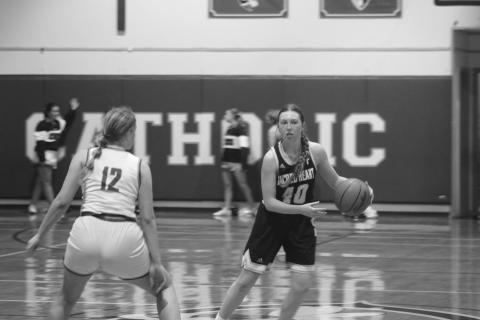 Rose Ardoin (40) moves the ball down the court in Sacred Heart’s 54-43 win over Catholic-Pointe Coupee in the first round of the girls’ basketball playoffs. (Gazette photo by Tony Marks)