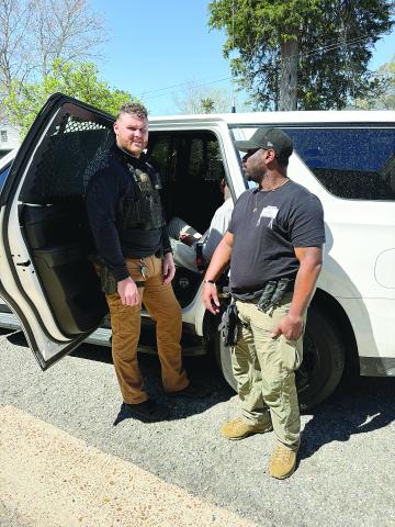 Deputies with the Criminal Patrol Unit of the Evangeline Parish Sheriff’s Office escort Trae’land Castille, 19, of Arnaudville, out of a police unit and into the Evangeline Parish Courthouse for his initial court hearing on Monday, March 17. His arraignment date is set for Monday, May 5, in Division A. (Photo courtesy of EPSO)