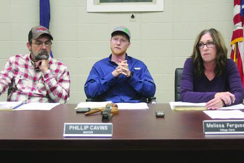Phillip Cavins (center) presides over his final meeting as mayor of Turkey Creek on Tuesday, January 17. Cavins will be replaced by newly elected Bert Keith Campbell, who will take office on Tuesday, January 24. Also pictured are Councilman Eric Chapelle (left) and Village Clerk Melissa Ferguson (right). (Gazette photo by Tony Marks)