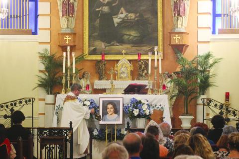Fr. Josh Guillory is pictured above as he incenses around the altar during the 67th Anniversary Mass honoring Servant of God Charlene Richard. The Mass was held Tuesday, August 11, at St. Edward Catholic Church, in Richard. (Gazette photo by Tony Marks)