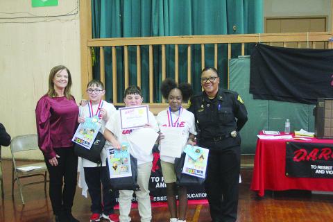 D.A.R.E. graduation is held at CE;  essay winners are named