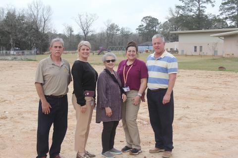 Pictured are (from left) school board member Arthur Savoy, Bayou Chicot Principal Kim Soileau, school board member Peggy Forman, and BCE Assistant Principals Torrey Fontenot and Chris Fontenot. (Gazette photo by Tony Marks)