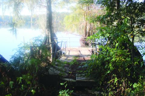 Pictured is a fishing pier that is located at the East Landing of Chicot State Park. (Gazette photo by Tony Marks)