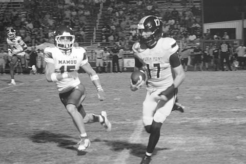 Mamou’s Payton Ashford (15) forces Church Point’s Luke Baudoin out of bounds in the Green Demons’ 41-18 loss to the Bears. (Gazette photo by Tony Marks)