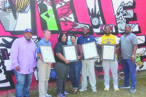 Basketball coaches receive proclamations