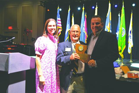 FRIEND OF THE VVA - Cody and Louise Vidrine were presented the Friend of the VVA (Vietnam Veterans of America) award for Chapter #632 in Ville Platte by President JD Soileau (center).