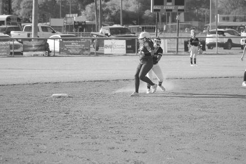Danilynn Landreneau (27) tags a Crowley base runner out at second base in Mamou softball’s 11-1 win on Tuesday. (Gazette photo by Tony Marks)