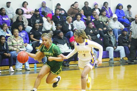 Janiah Leday (4) scored 22 points against Crowley to go over 1 thousand points in her career. (Gazette photo by Tony Marks)