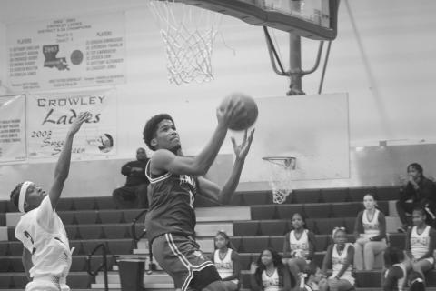 Ernest Dugas (0) goes up for a bucket in Mamou’s 75-54 win over Crowley. The win improved the team’s record to 20-4. (Gazette photo by Tony Marks)
