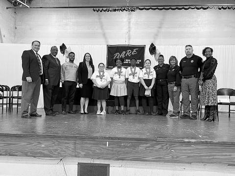 D.A.R.E. graduation is held at JSM; essay winners are named