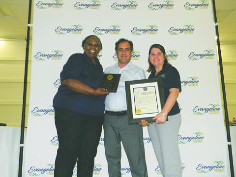 MAN OF THE YEAR - Pastor Steven Sawtelle with Hundredfold Coffee (center) was named Man of the Year. He is shown with Linda Fontenot (left) and Kristi Enicke (right). (Gazette photos by Heather Bogard)