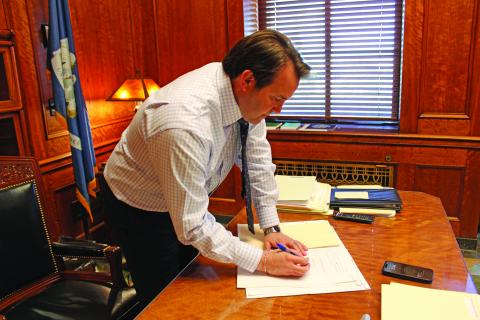 Speaker of the House of Representatives Phillip DeVillier signs bills that were passed in the House on Monday, March 18. The 2024 regular legislative session began Monday, March 11. (LSN photo by Claudette Olivier)