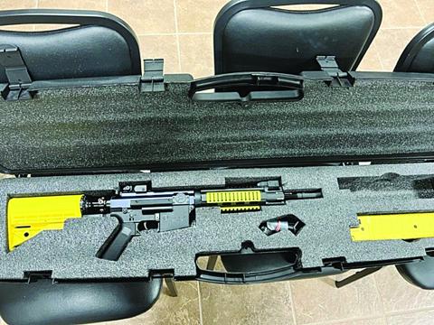 Pictured is the less than non-lethal pepper ball weapon that was donated from Phoenix Security to the Turkey Creek Police Department. (Gazette photo by Tony Marks)
