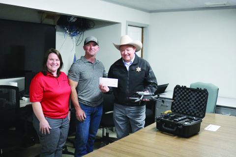 Pictured from left are Molly Smith and Shannon Trahan, both of Kinder Morgan, and Evangeline Parish Sheriff Charles Guillory. (Gazette photo by Tony Marks)