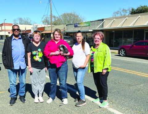 From left are Greg Colbert and Lori Horne with Scooby Dew Rescue along with Gail Peacock from Hotel Cazan, Jenn Shaw from EPAR, and Camille Fontenot from Hotel Cazan. Scooby Dew Rescue received its 501c3 status last fall and had assisted and or rescued close to 300 dogs and several cats. (Gazette photo by Tony Marks)