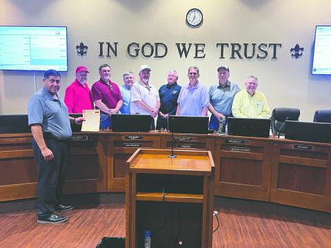 During the March 2, meeting of the Evangeline Parish Police Jury, the jury proclaimed the month of March as American Red Cross Month. Shown, from left, are Chris LeDee (Acadian Ambulance Community Relations Supervisor), jurors Bryan Vidrine, Ryan Ardoin (vice president), Tim Causey, Keith Saucier, Brent Guillory, Kevin Veillon (president), Sidney Fontenot and Dirk Deville (secretary/treasurer). (Gazette photo by Nancy Duplechain)