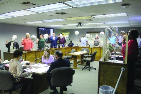 Standing from left are Sheila Joseph, District 7; Karen Vidrine, District 3; Kristy Briley, District 9; Donald Anderson, District 13; Lonnie Sonnier, District 1; Calvin Leday Jr., District 12; Wayne Dardeau, District 4; Nick Chaumont, District 2; Mike Fontenot, District 6; Bobby Hamlin, District 11; Fannie Soileau, District 10; Monica Andrus, District 5; and Wanda Skinner, District 8. (Gazette photo by Tony Marks)