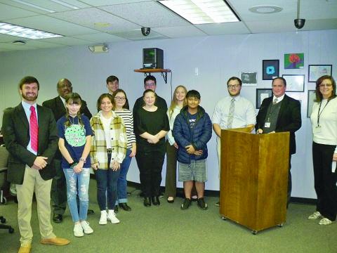 Pictured with Evangeline Parish Superintendent Darwan Lazard, Assistant Superintendent Michael Lombas, and Pine Prairie Principal Alice Lejeune are the honor band students from Pine Prairie and Bayou Chicot. In no particular order are Kurt Agdon, Luke Chapman, Grace Bordelon, Koby Smith, Madison West, Julie Mabe, Raeanna Fontenot, and Adyson West. Also pictured are band directors John Havard and Kevin Naquin. (Gazette photo by Tony Marks)