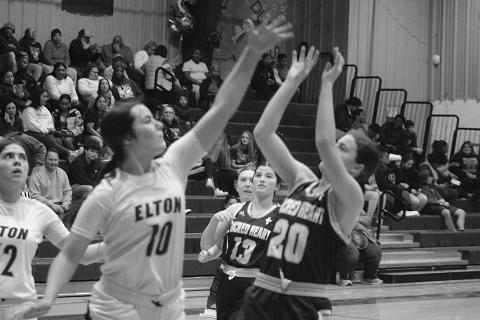 Sacred Heart’s Alyssa Brignac (20) finishes her shot in a win against Elton on Thursday night. (Gazette photo by Tony Marks)