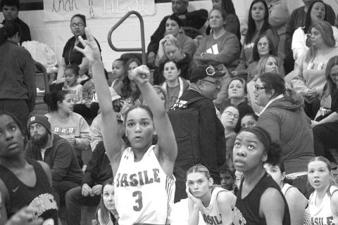 Basile sophomore Garryn Ivory fires up a three-pointer in Basile’s 45-33 win over Eunice on Tuesday night. Ivory led all scorers with 24 points. (LSN photo by Rhett Manuel)