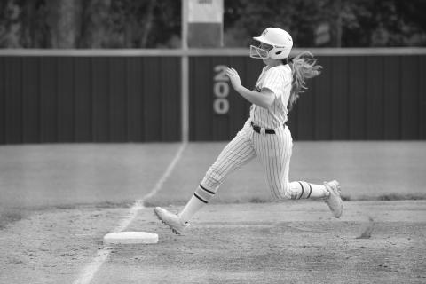 Emily Ardoin (10) steps on the third base bag before heading home for a Sacred Heart run in an 18-0 win over False River Tuesday. (Gazette photo by Tony Marks)