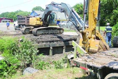 Pictured is work being done on Freddie Dunn Street, in Ville Platte, where a new bridge is being installed. The work began on Monday, June 5, and was expected to last three or four days. (Gazette photo by Tony Marks)