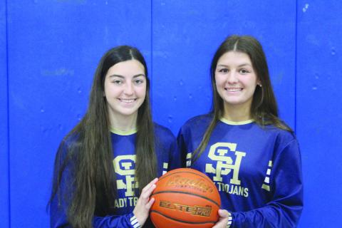 Breanna Ardoin (left) and Kali Shiver (right) were named Evangeline Parish’s Co-Most Valuable Players in girls’ basketball after helping lead their Sacred Heart Lady Trojan team to a state tournament appearance at Southeastern Louisiana University in Hammond. (Gazette photo by Rhett Manuel) 
