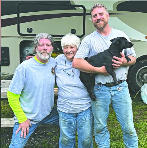 From left, in the left photo, volunteer drivers Paul LeJeune (left) and James Moran (right), along with Gretta Ardoin (center) played a vital role in escorting the dogs on the long drive up to Pennsylvania.