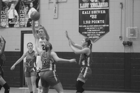 Bre Ardoin (24) looks to pass the ball to a Sacred Heart teammate in a 42-41 loss to Hackberry on Tuesday night. (Gazette photo by Tony Marks)