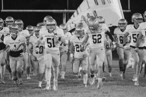 The Sacred Heart Trojans will take the field tomorrow night in the first round of the Select Division IV playoffs against Covenant Christian. The team is seeking its second playoff win since 2013 and first since a win over St. Edmund last season. (Gazette photo by Rhett Manuel)