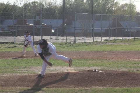 Panther pitcher Colin Ardoin (13) finishes his follow through motions after delivering a pitch earlier this season. (Gazette photo by Tony Marks)