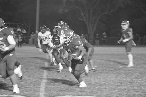 Horace Edwards Jr. finds a running lane for Basile. He and the rest of the Bearcats now host Haynesville in the quarterfinals. (Gazette photo by Sylis Manuel)