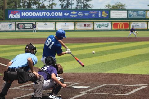 Sacred Heart pitcher and outfielder Briggs Ardoin puts the bat on the ball Tuesday morning in the LBCA Uncerclass All-State games. Ardoin was selected to the West squad. Over the two days, he pitched and played outfield.  (Gazette photo by Rhett Manuel)