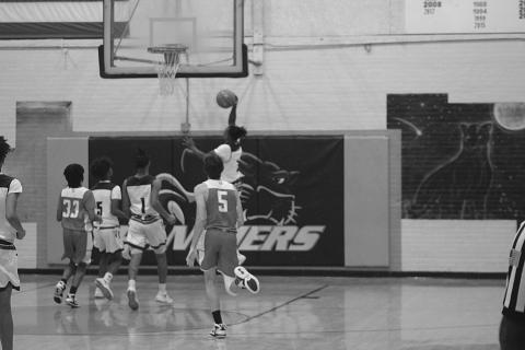 Latelldrick Prejean (3) gains elevation as he looks for points against Basile for the Ville Platte Bulldogs in the parish tournament. (Gazette photo by Rhett Manuel)