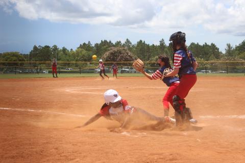 Ville Platte 10U All-Star Taylor Edwards slides into home plate after escaping a run down in her team’s 7-0 shutout win over West Mobile on Thursday at the All-American Youth Sports World Series in Gulfport, Miss. Ville Platte went 1-1 in pool play on Thursday and entered the double-elimination bracket portion of the tournament at the No. 5-seed. (Gazette photo by Rhett Manuel)
