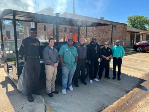 From left are Evangeline Parish Sheriff Deputies George Washington Goldman and Chase Melancon, Evangeline Parish Police Jury Vice President Ryan “LeDay” Williams, Lieutenant Scott Clarkson, Reginald Watts, Assistant Warden and First Lieutenant Barry Giglio, and Tapas Sarma of James2Ministry. (Gazette photo by Tony Marks)